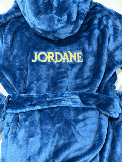 Plush fleece navy blue bathrobe with hood and custom embroidery name on back.