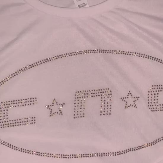 Video of custom rhinestone design  on white t shirt